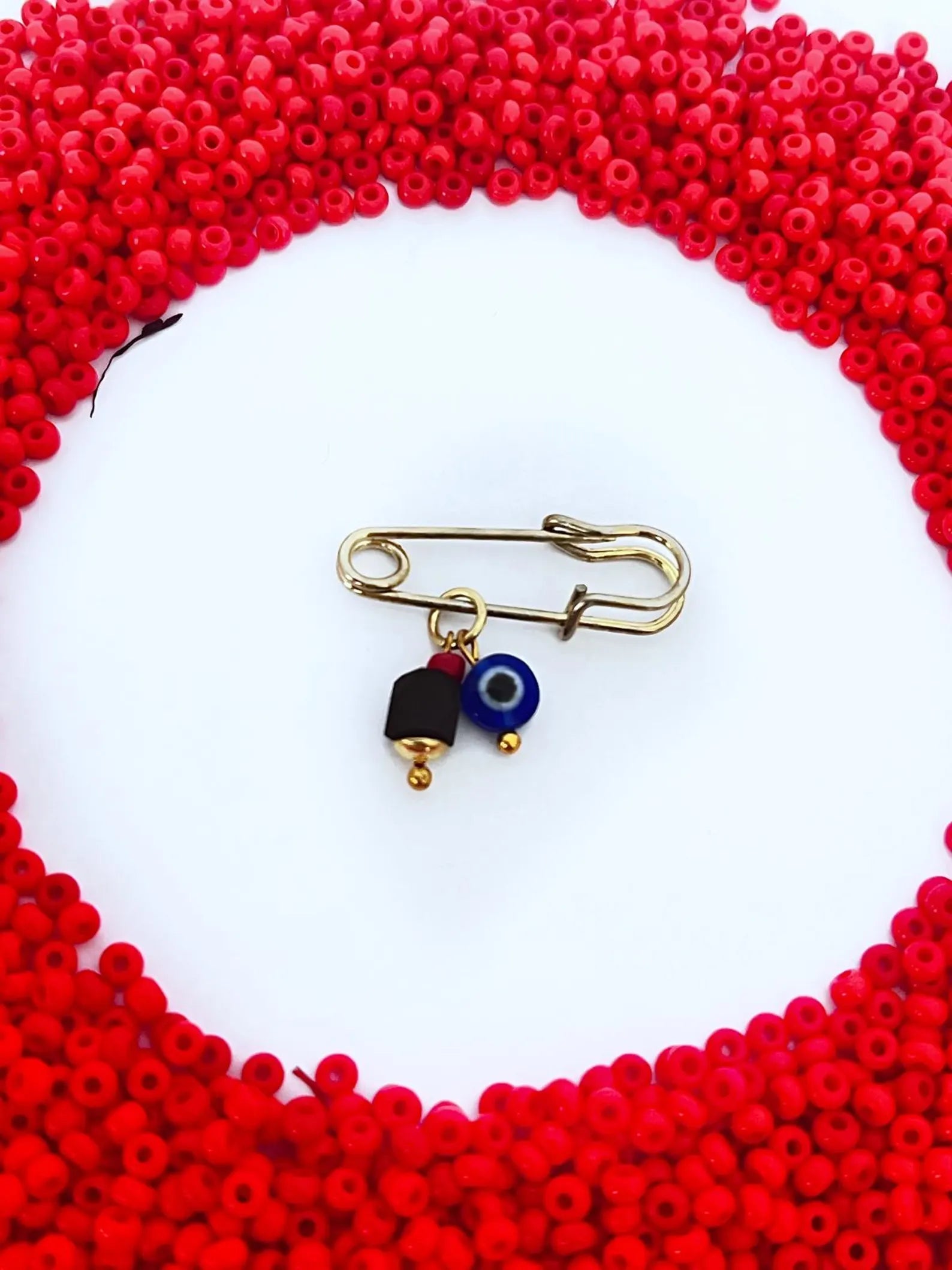 -Baby Pin Azabache y ojo turco azul amuleto proteccion-
